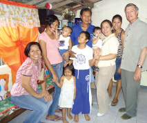 Steven M Hilton visits the family of Mathew Papango.tif
