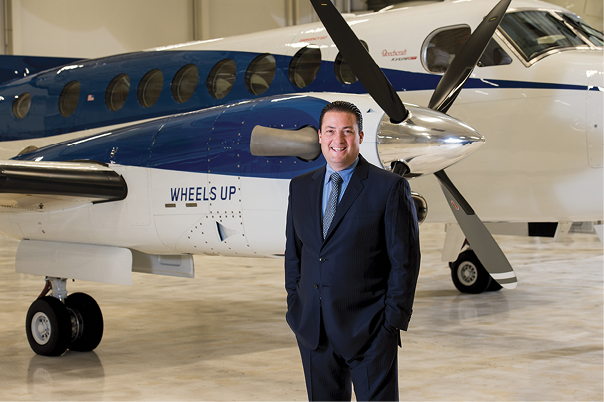 Kenny Dichter in front of a Wheels Up King Air 350i