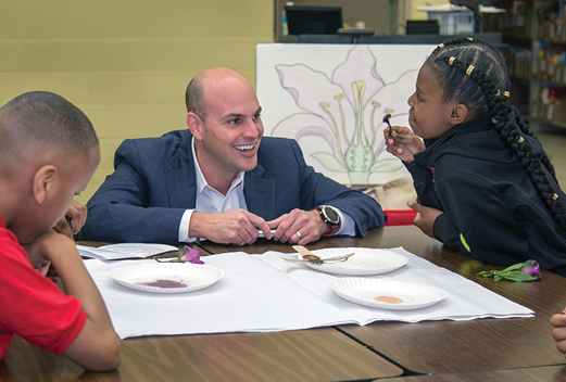 Ridgway White visits with students at Flint’s Durant-Tuuri-Mott Elementary School