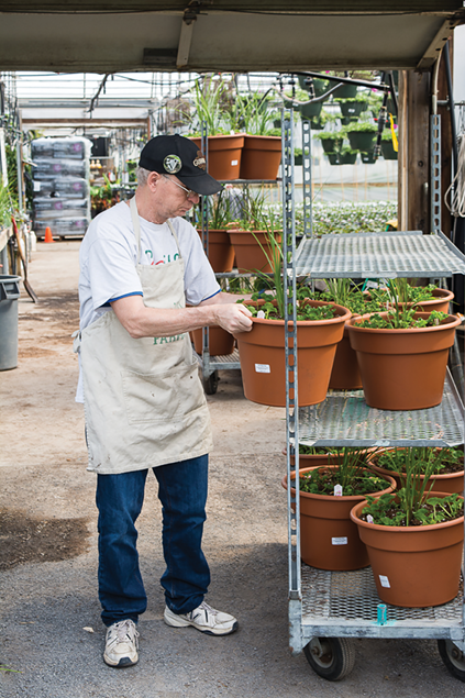 Kevin McCann working at Smile Farms