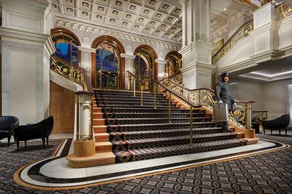 The grand stairway of the Lotte New York Palace