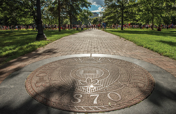 The seal of The Ohio State University on its campus in Columbus