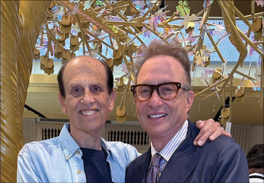 Michael Milken and Miles Nadal